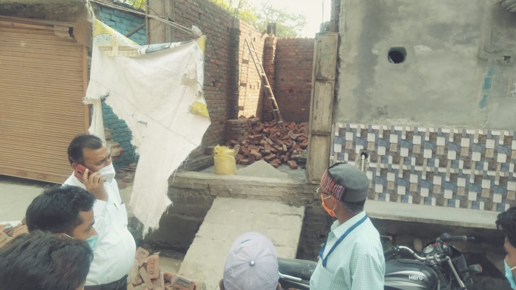 Tehsildar stopped construction of shop being built on government land