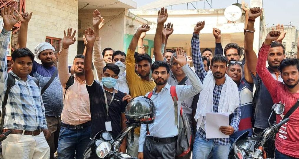 Contract workers demonstrate at the power station