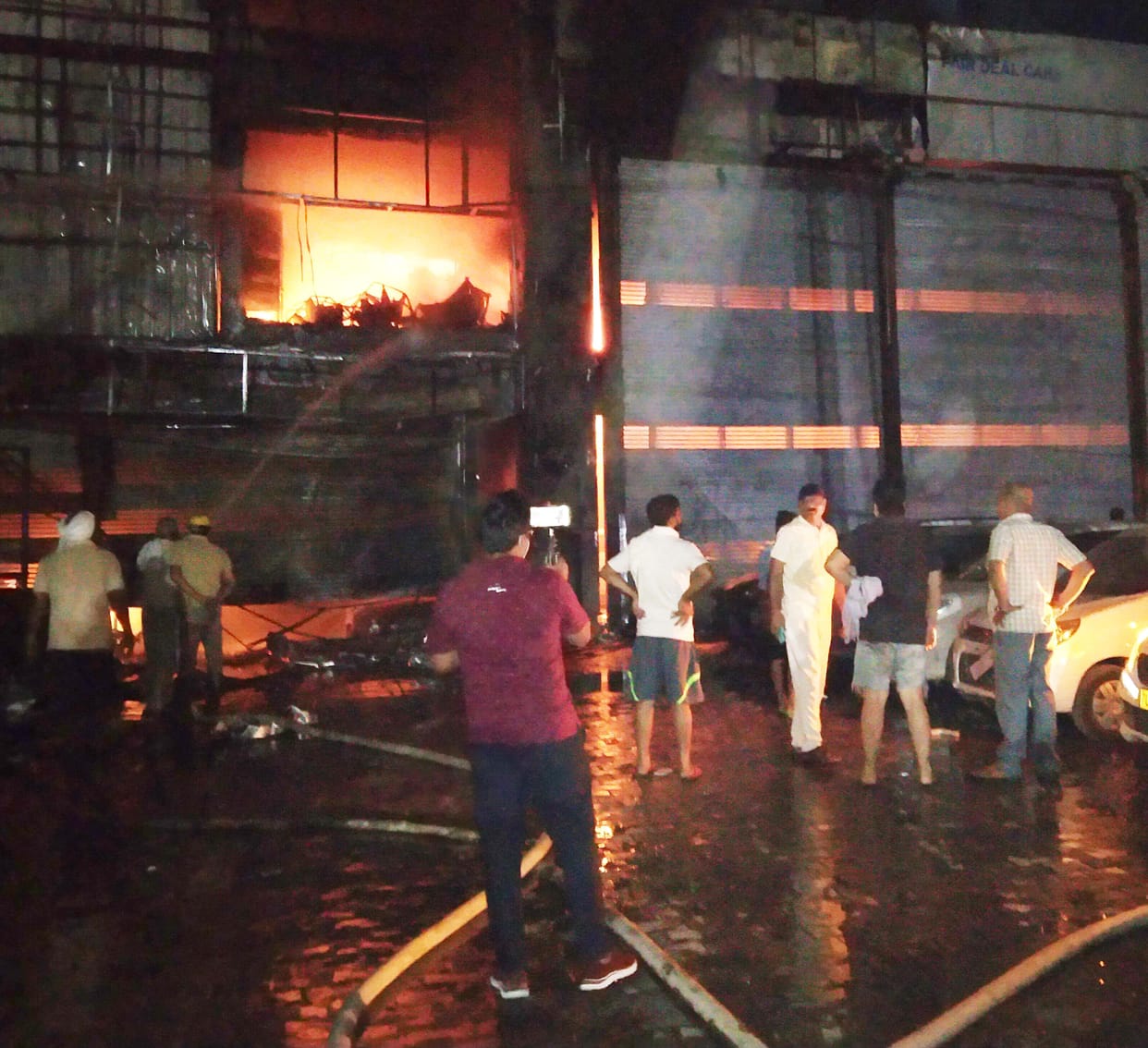 fire in car showroom