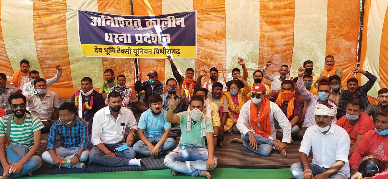Taxi union officials sit on indefinite strike