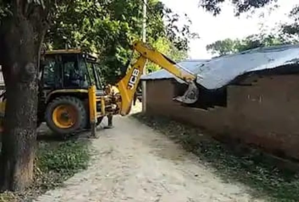 Police demolished home of Gram Pradhan alleged in kidnapping case.