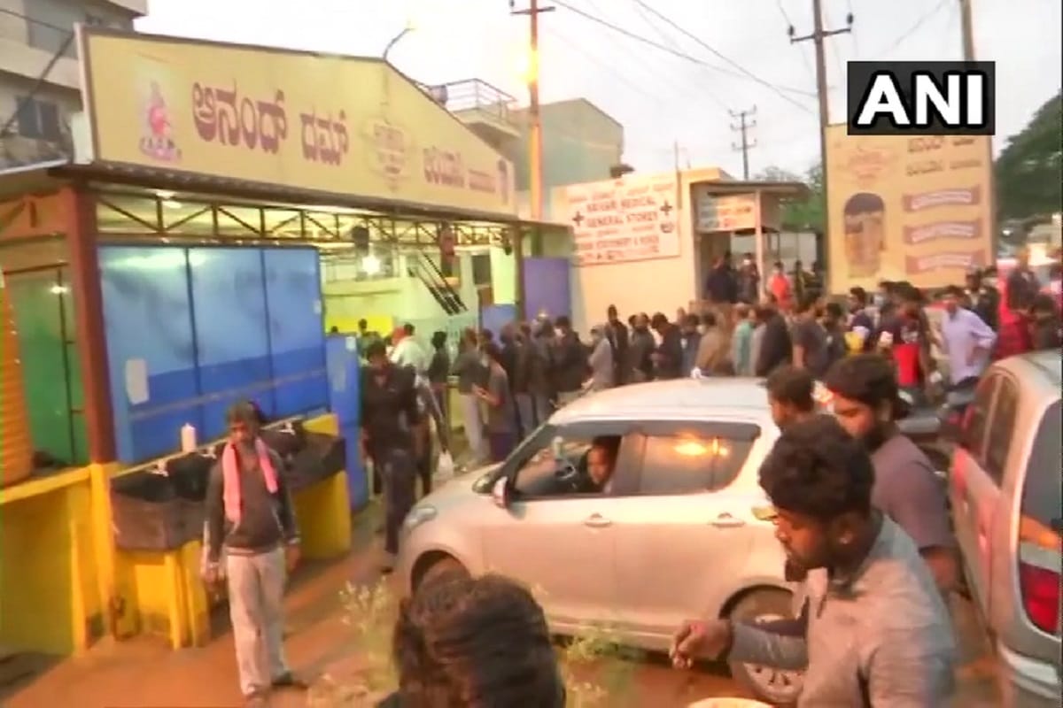 Karnataka: People queue up at an eatery in Hoskote to buy biryani