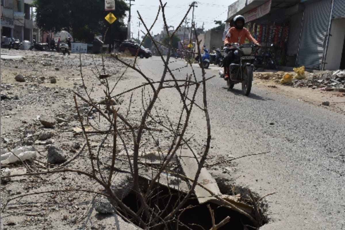 Manhole caps installed two feet above the road, frequent accidents in Meerut