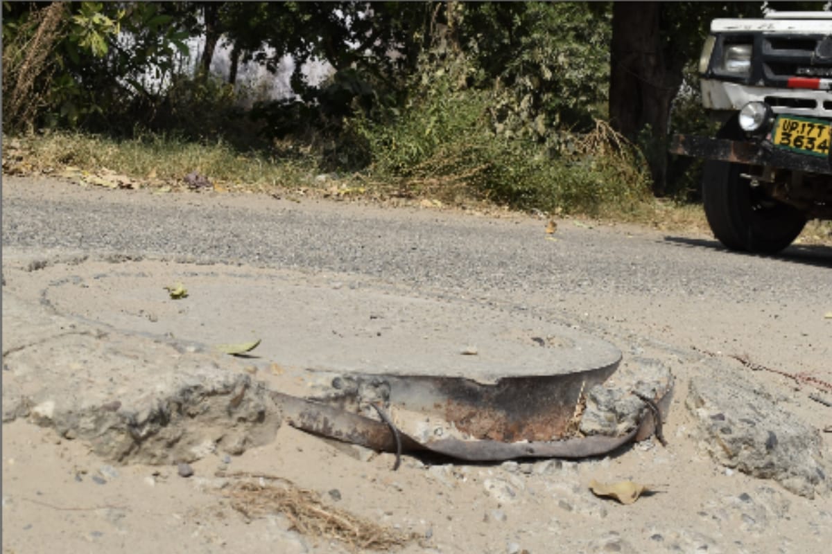 Manhole caps installed two feet above the road, frequent accidents in Meerut