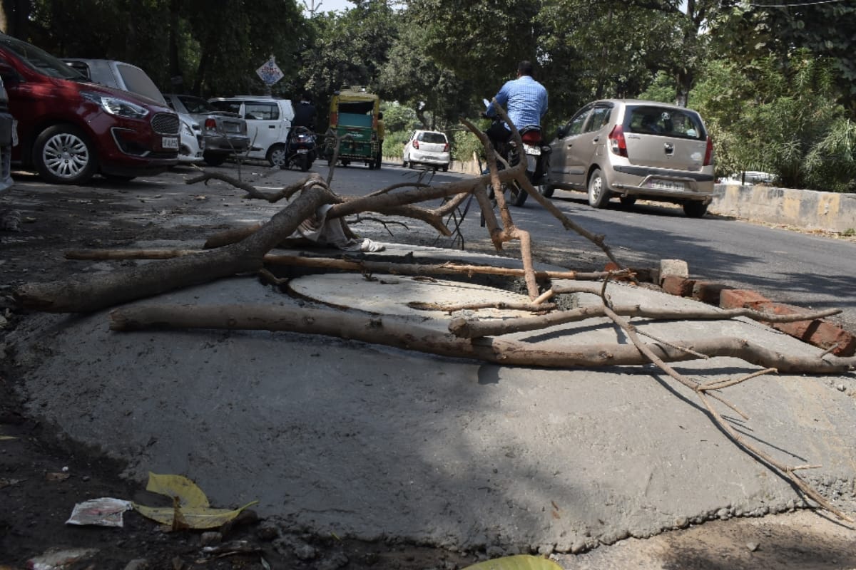 Manhole caps installed two feet above the road, frequent accidents in Meerut
