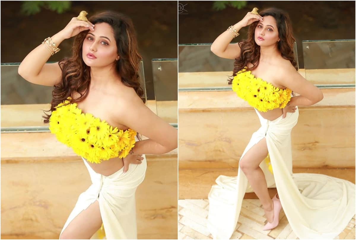 rashmi desai show sizzling in photoshoot sunflower top with thigh high white skirt