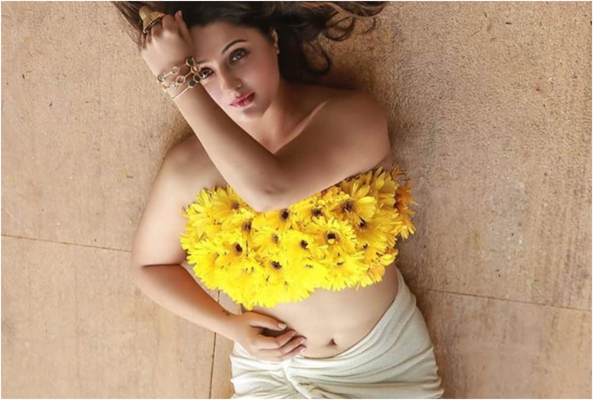 rashmi desai show sizzling in photoshoot sunflower top with thigh high white skirt