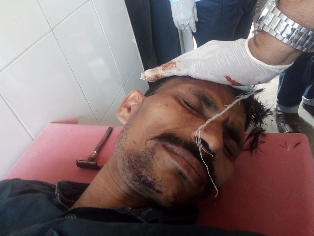 firing during selection of quota shop, one killed, half a dozen injured