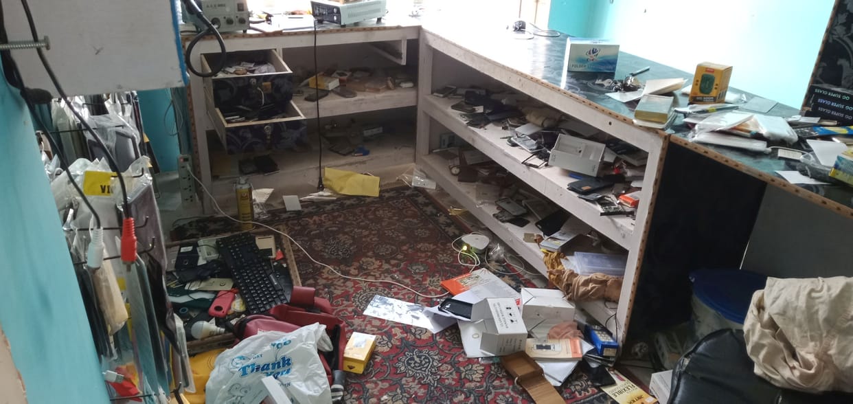 Cash and goods crossed from two shops