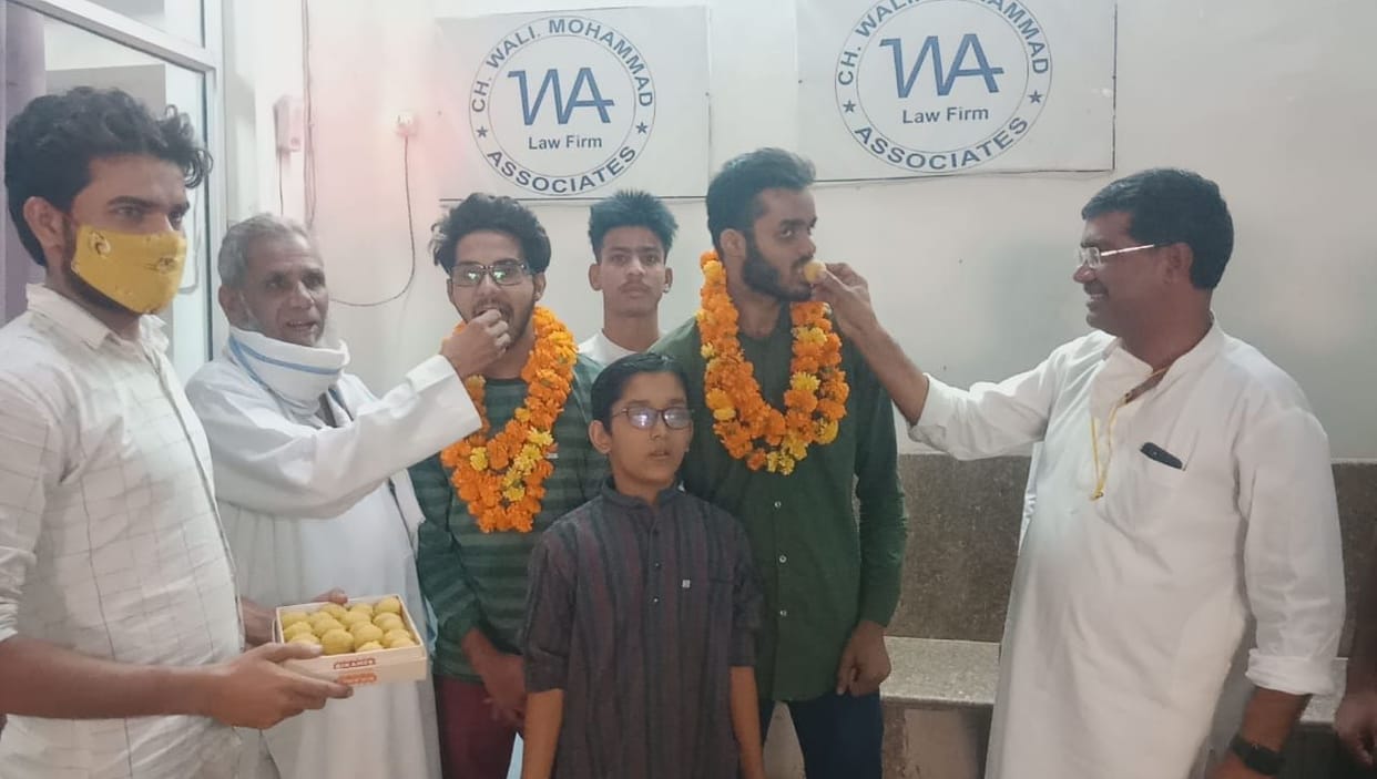 Wasim awarded for securing good marks in Neet