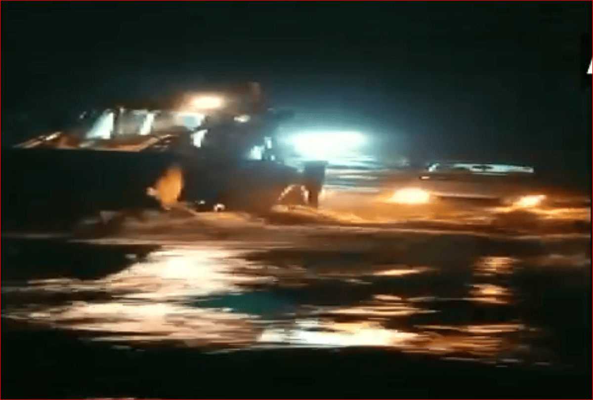 2 car passengers stuck in an overflowing canal rescued using JCB in Rangareddy area in telangana