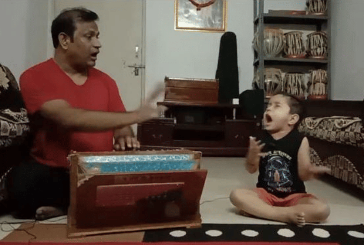 amitabh bachchan shares video of little boy learning classical music from his father
