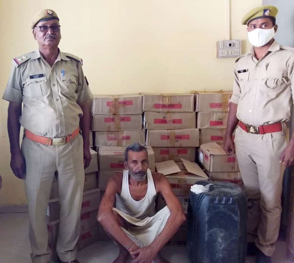 Police arrested a youth with 50 boxes of illicit liquor and equipment in Mahoba.