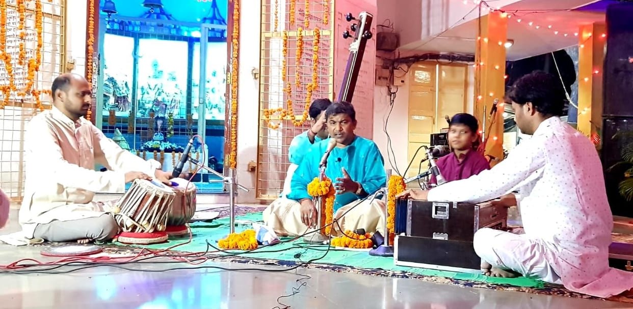 Charmed by reciting devotional songs