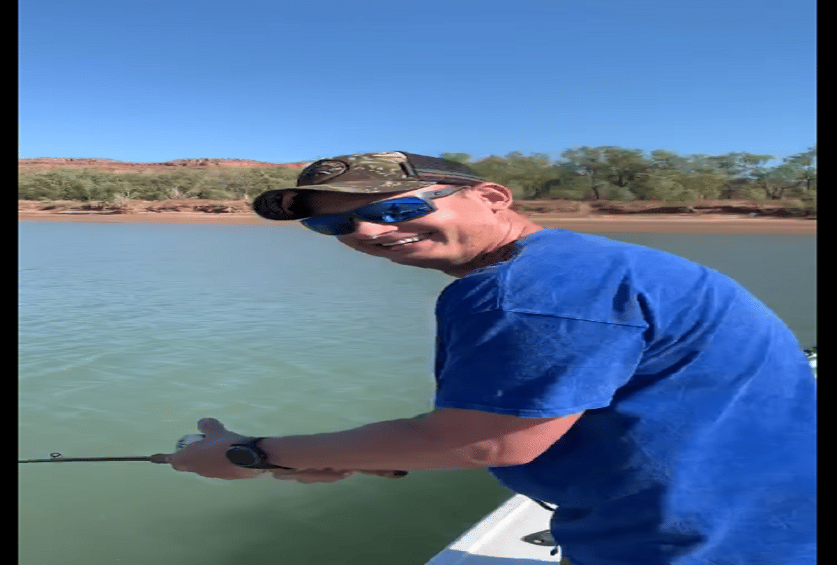 fisherman accidentally hooked a crocodile in australia video goes viral