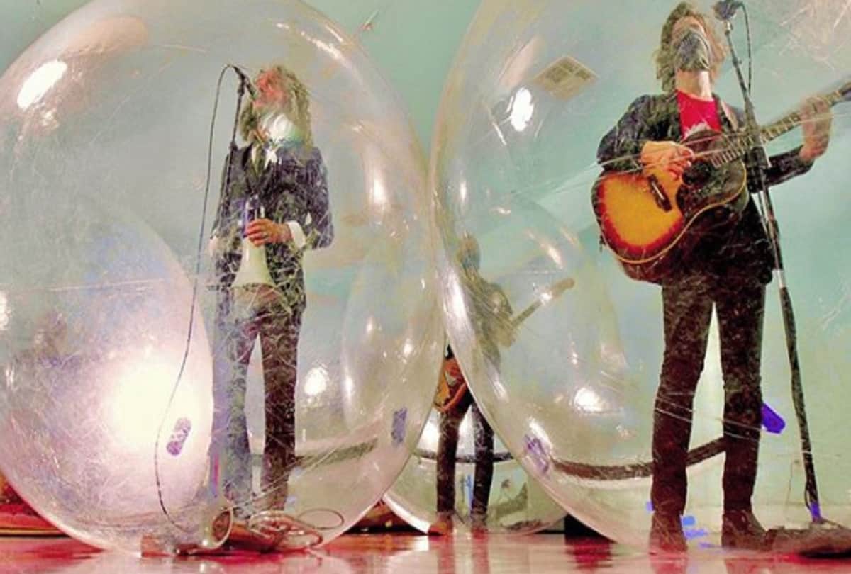 The Flaming Lips performed a music concert with the band and fans encased in plastic bubbles during coronavirus