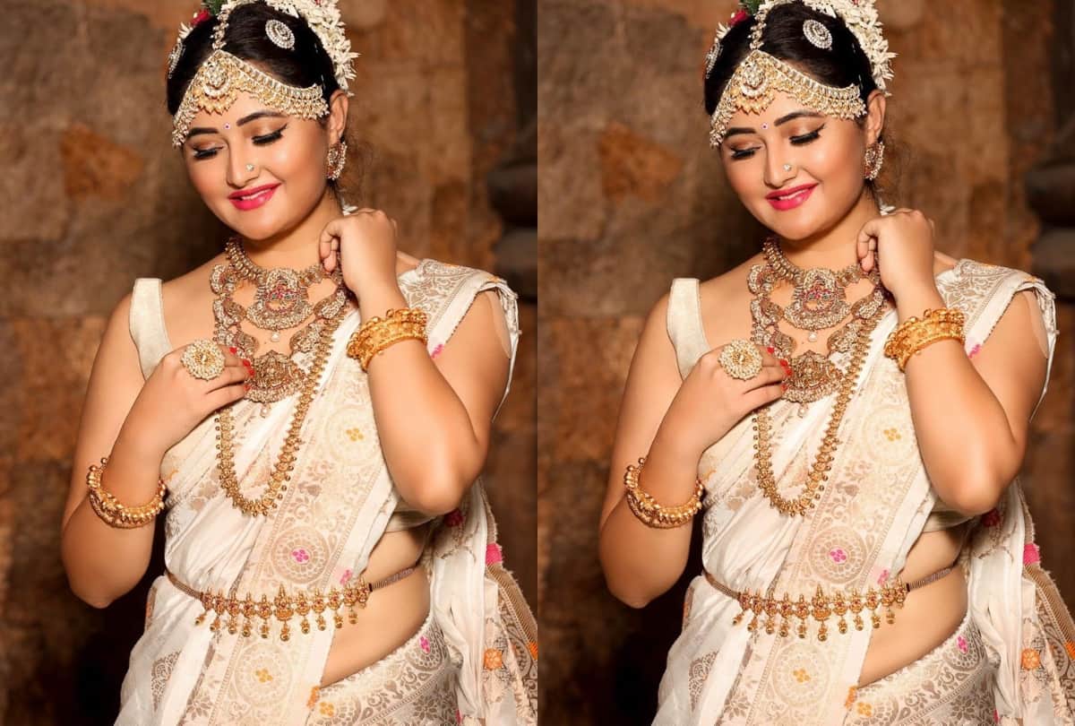 rashmi desai bold photoshoot in white shirt with matching bralette
