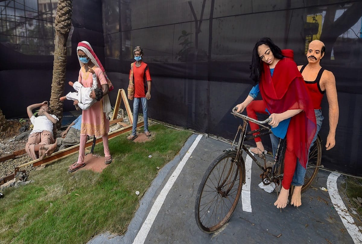 Kolkata Durga Puja 2020 News: West bengal corona virus lockdown effects show in durga puja pandal at kolkata pictures goes viral sonu sood statue