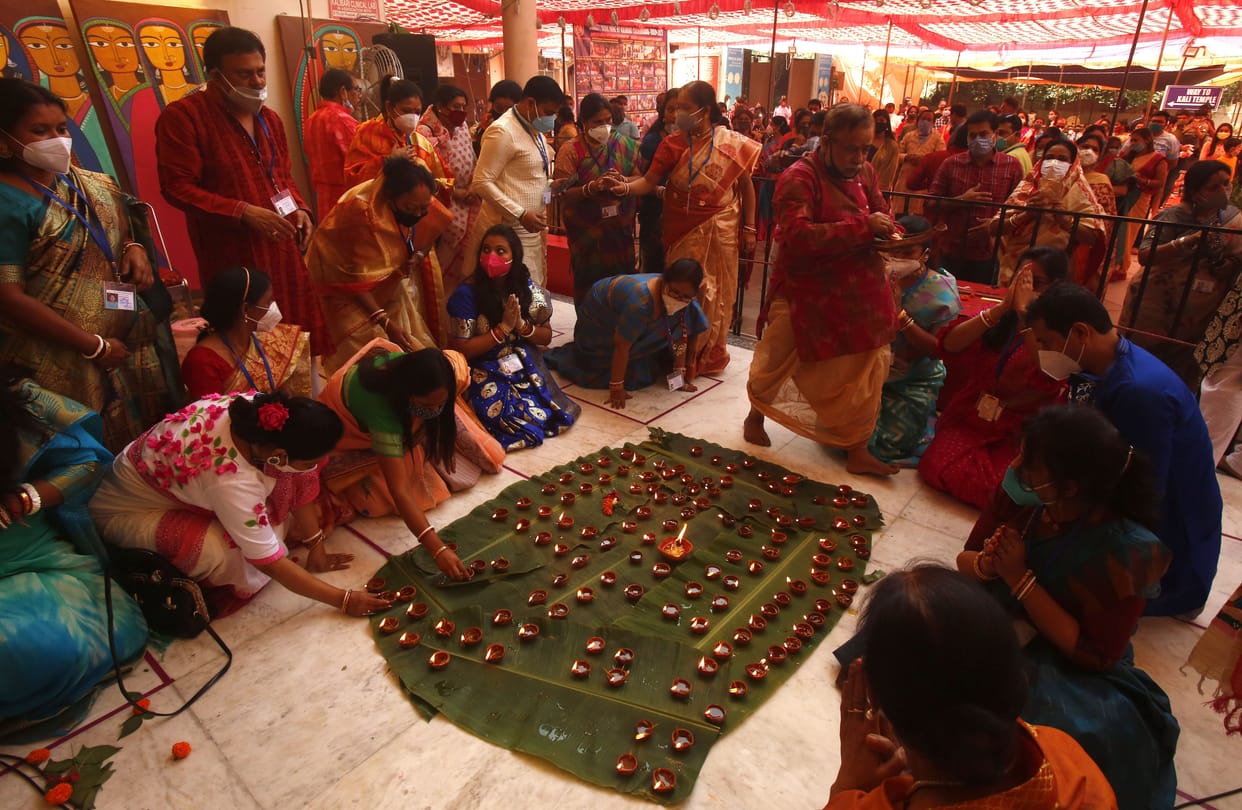 Devotees worship Mother Durga at Bang Bhawan and Kalibari