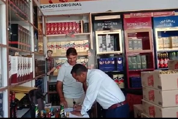 Were selling liquor at high prices, caught
