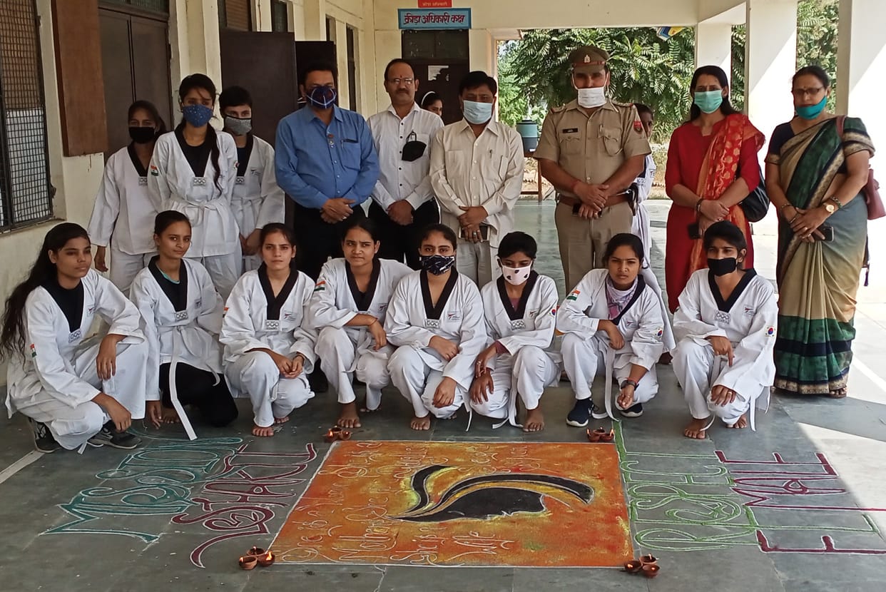 Girls made attractive Rangoli
