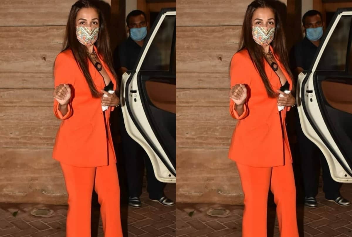 malaika arora birthday celebration in bright orange pant suit with black bustier