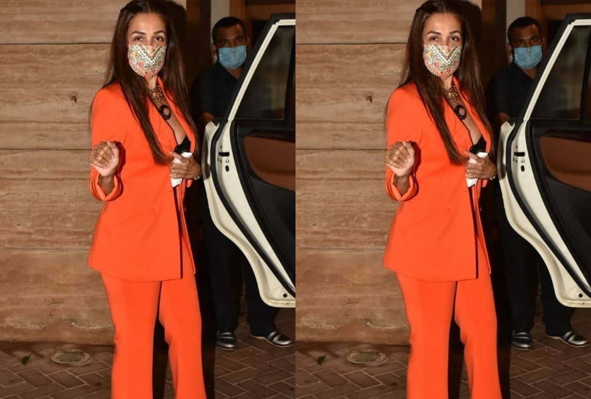 malaika arora birthday celebration in bright orange pant suit with black bustier