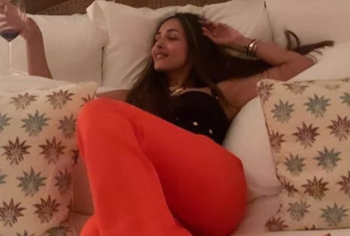 malaika arora birthday celebration in bright orange pant suit with black bustier