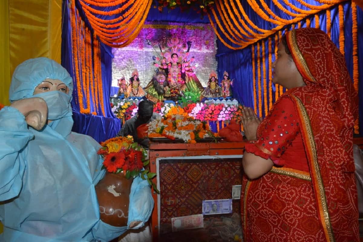 Navratri 2020: Maa Durga kills Corona in Banaras wearing PPE kit to statue, installing idols in pandals