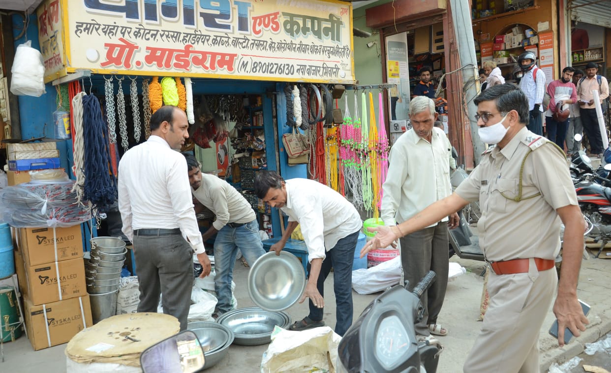 police, encroachment, market, shopkeeper