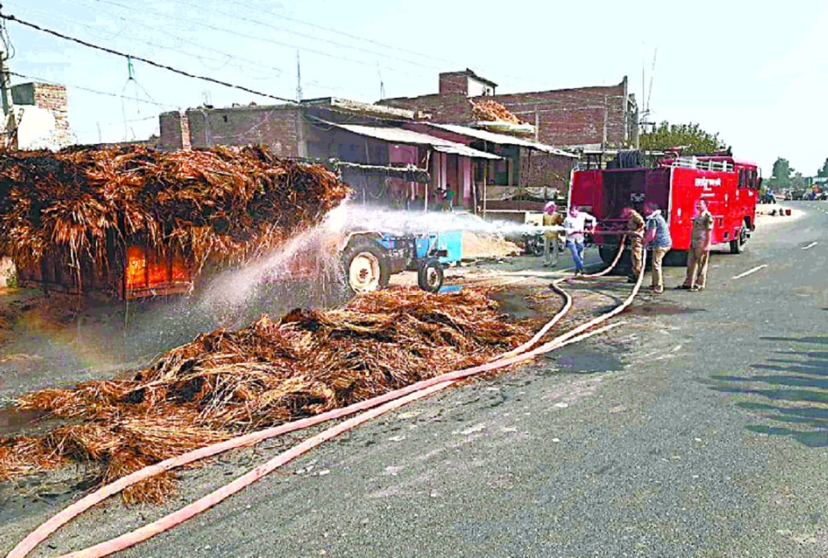 Fire from high-tension line in straw filled to height