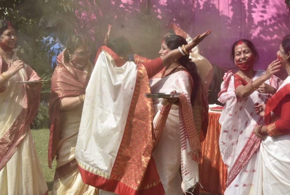 People immersed the idols of godess Durga.