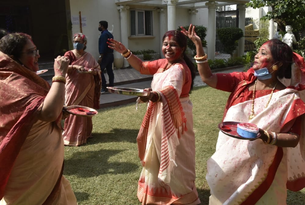 People immersed the idols of godess Durga.