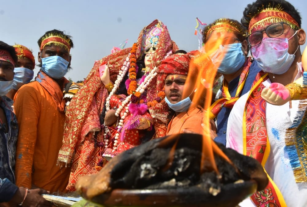 People immersed the idols of godess Durga.