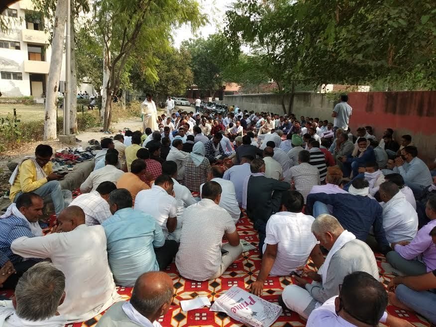 Fellow employees protest against the suspension of five employees of Electricity Corporation