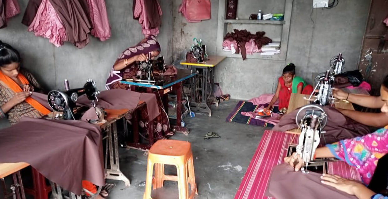 Support groups are stitching uniforms with the help of others