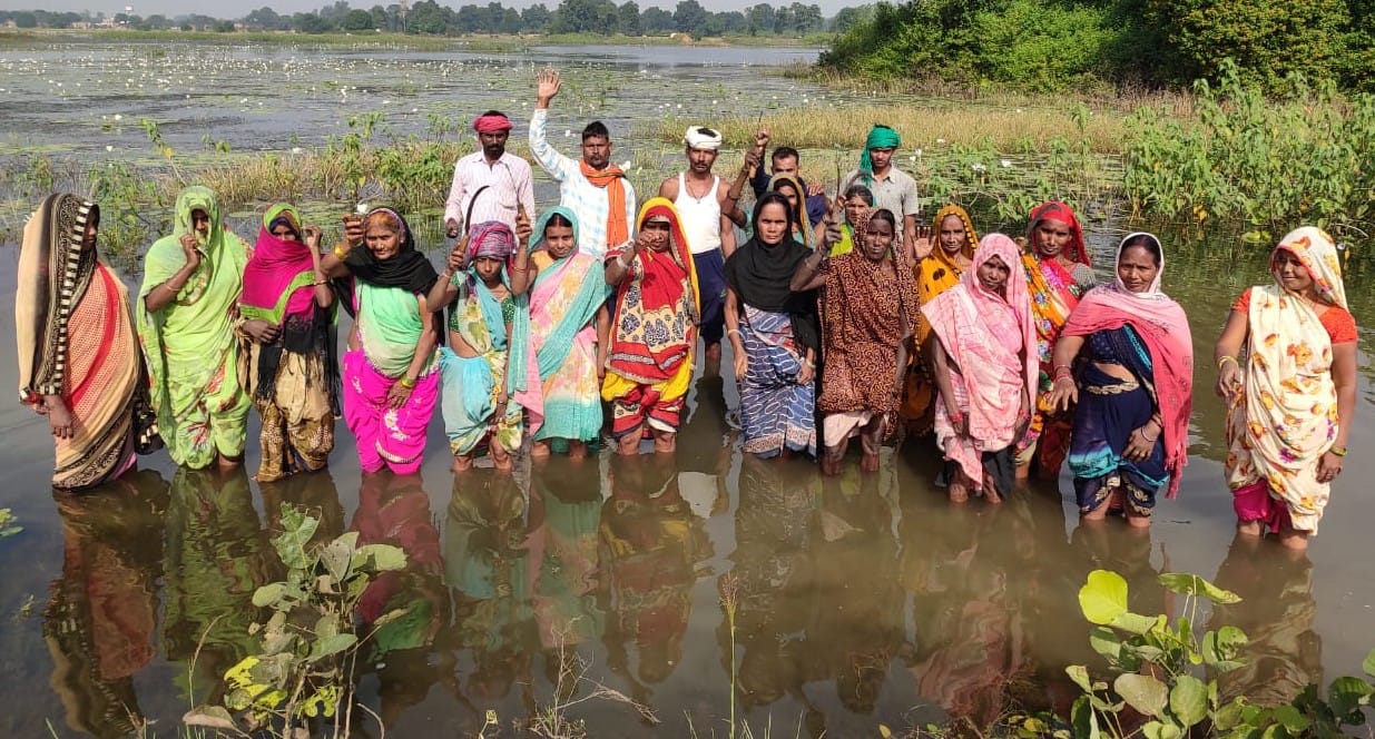 Farmers protested by standing in water