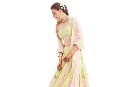 kajal aggarwal wear pink and yellow lehenga in gour puja