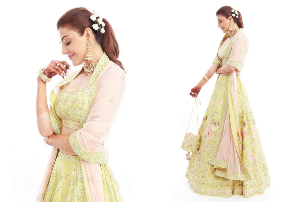 kajal aggarwal wear pink and yellow lehenga in gour puja