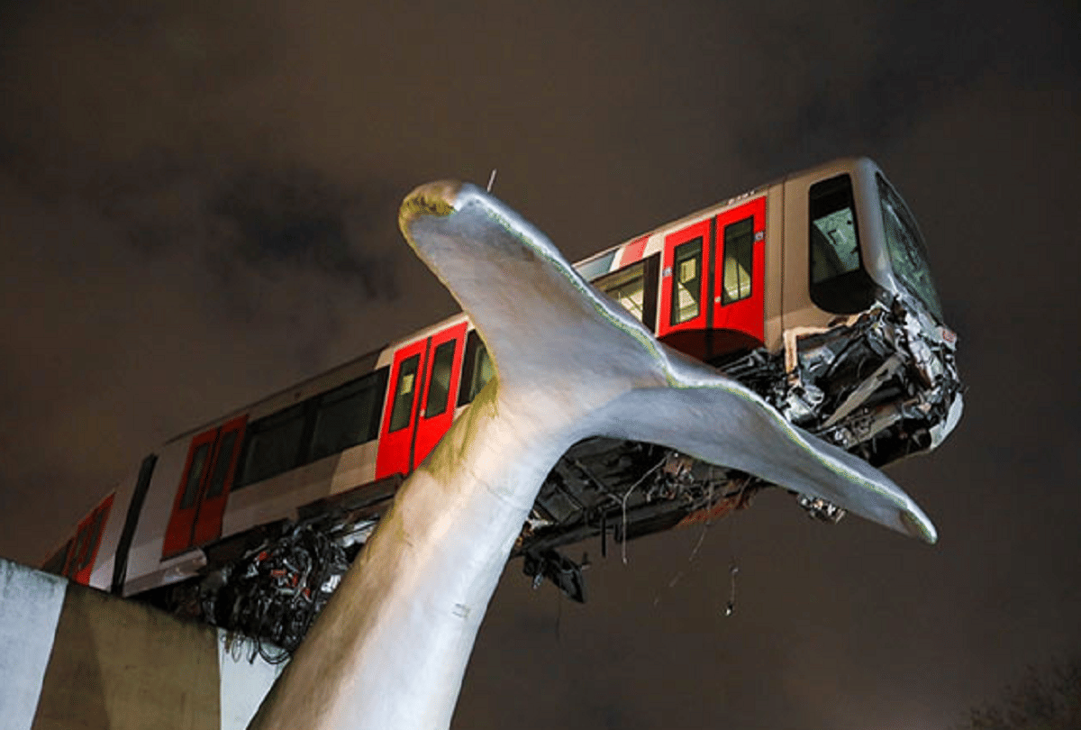 netherlands metro train out of control lands on whale sculpture after crashing