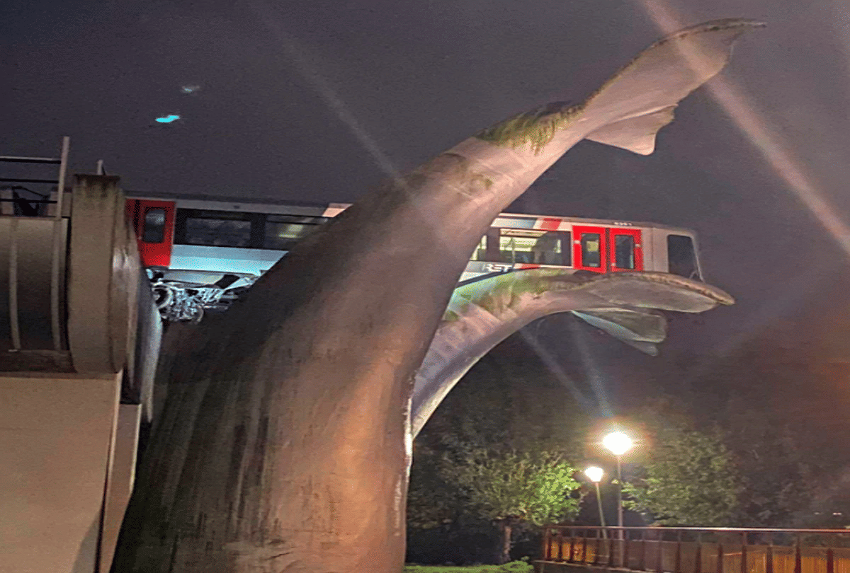 netherlands metro train out of control lands on whale sculpture after crashing