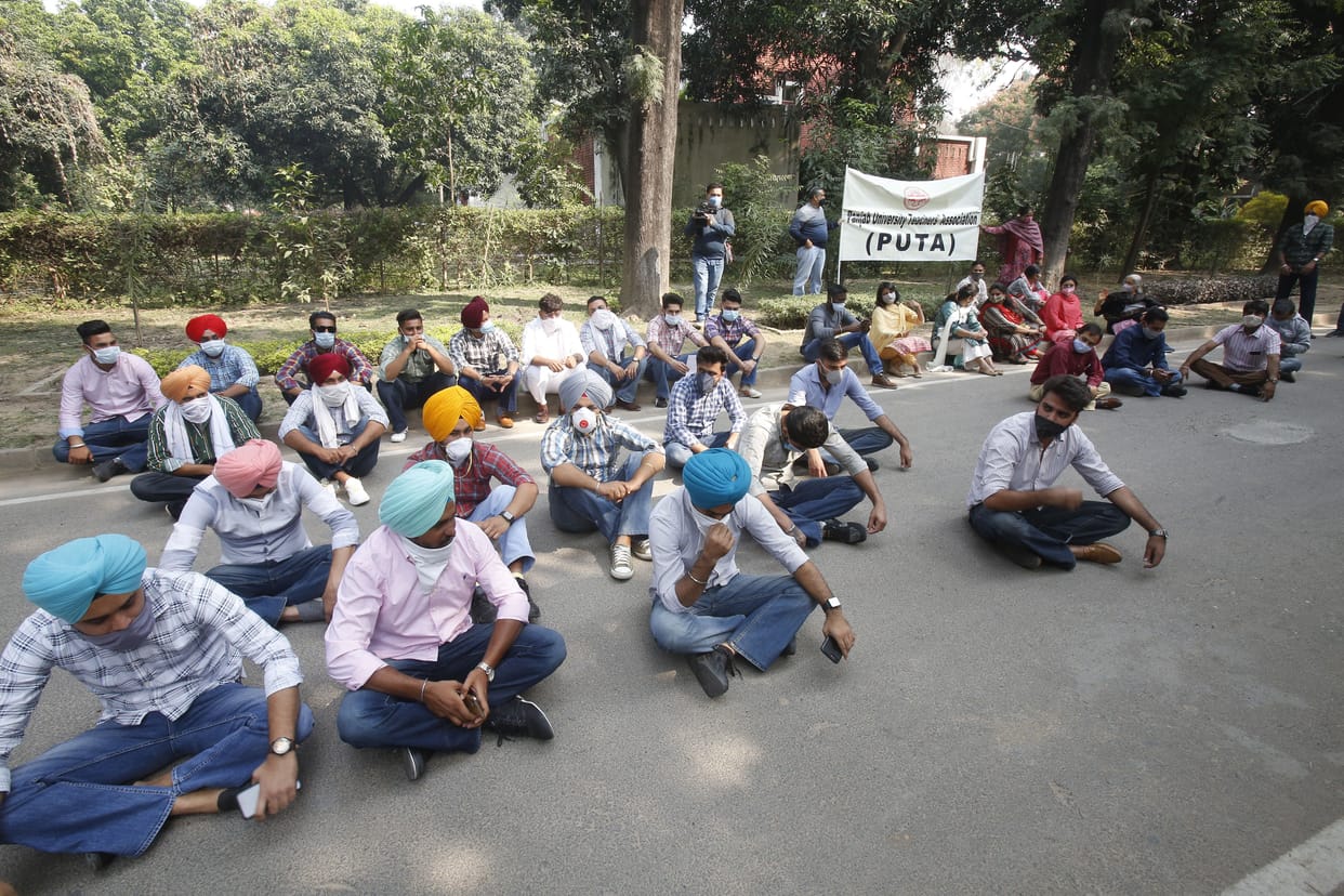 Protest outside VC accommodation when no promotion