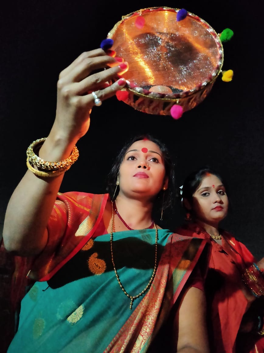 Asks blessing from moon, long life of  husband and every birth should be with
