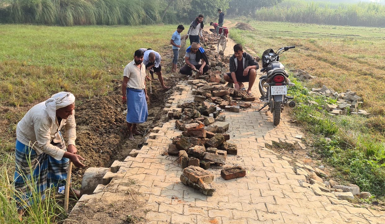 Tired of pleading, youth themselves took up the road repair