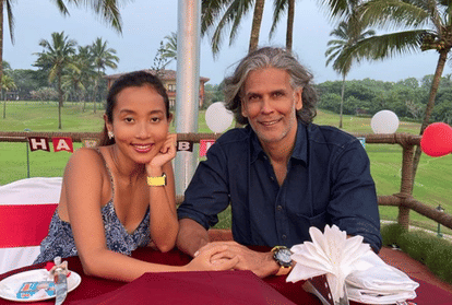 photo:Milind Soman Lifts Wife Ankita Konwar On His Shoulder