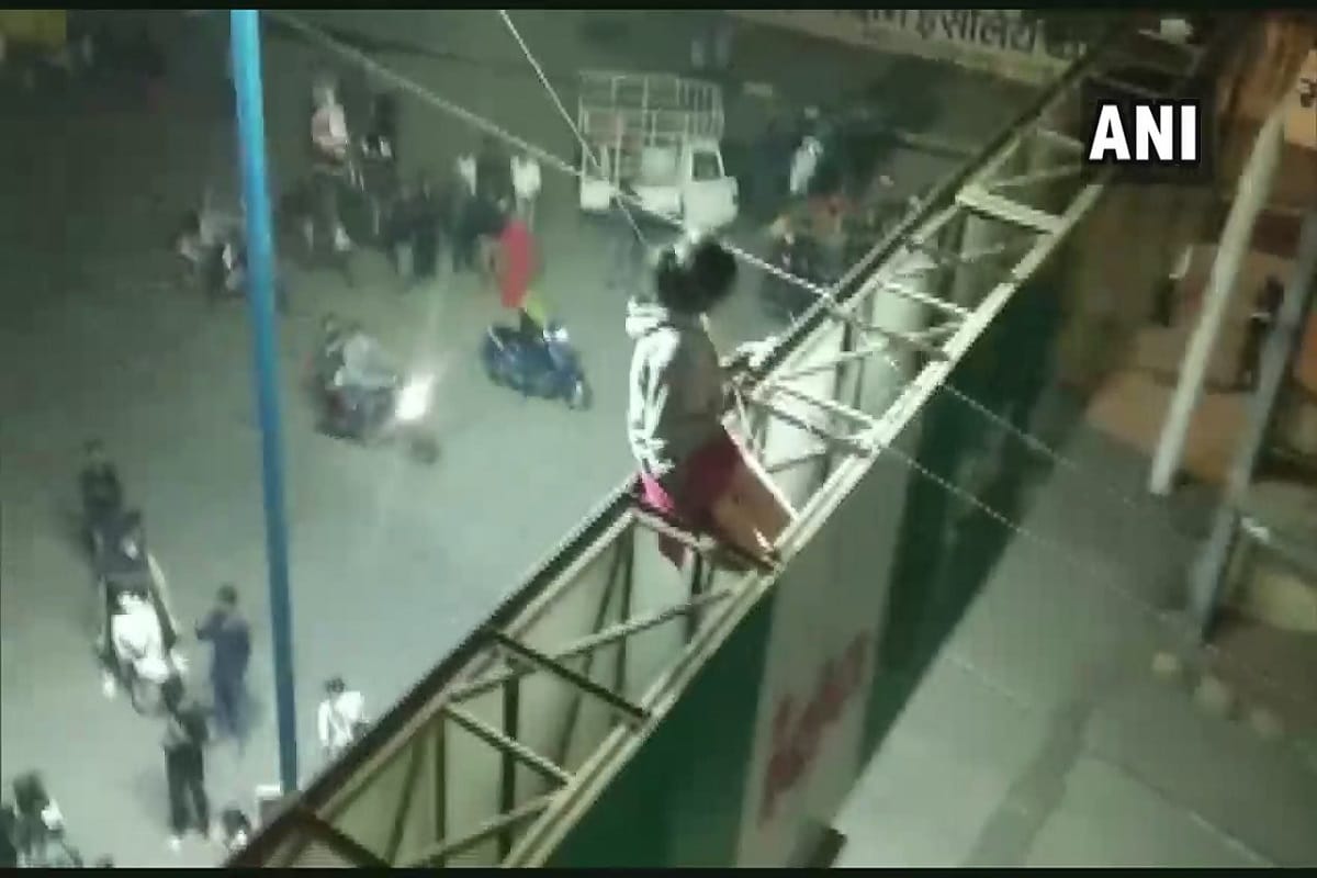 Madhya Pradesh: A girl climbed atop a hoarding at Bhandari Bridge in Indore's Pardesipura