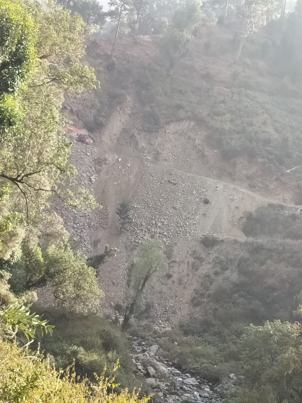 People angry over road debris being thrown into the river