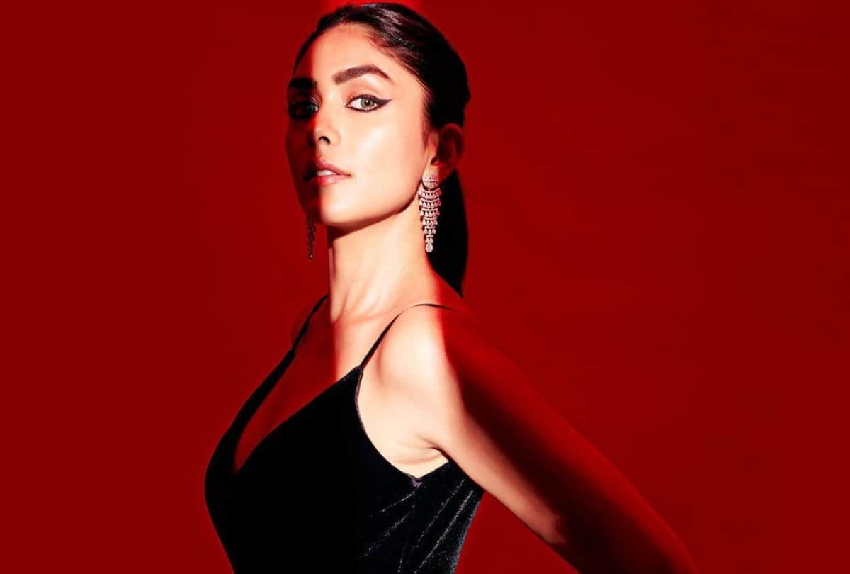 mrunal thakur shows toned legs in black thigh high slit gown in latest photoshoot
