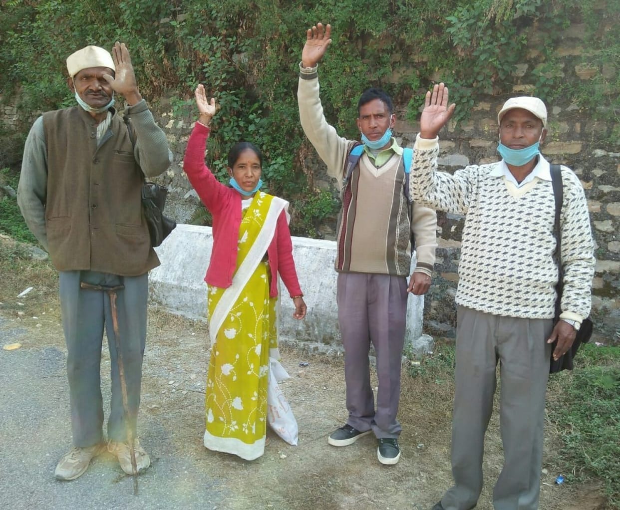 Demonstration demanding compensation of cut land in the road