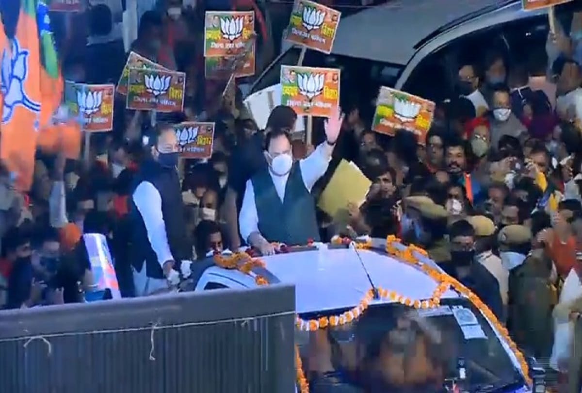 Bihar election celebration Modi Nadda's cut out in BJP office Delhi workers wearing saffron safa